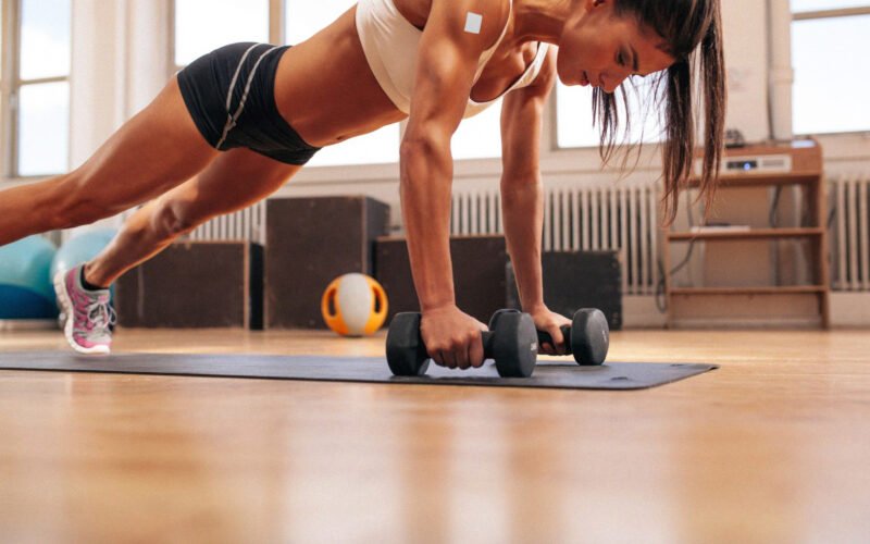 Person performing strength training exercises at home